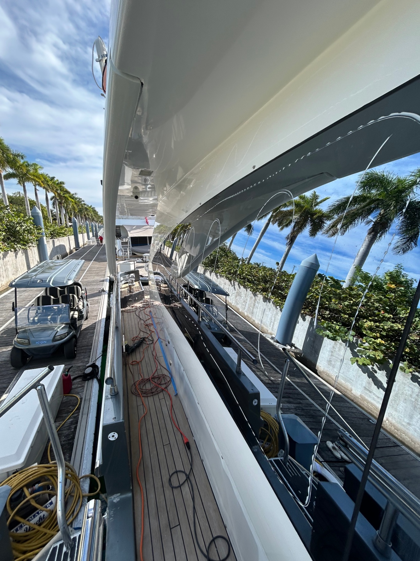 White superyacht side deck after a full detail at Island Gardens